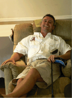 Longest Drive winner, Jon McGee wins a recliner donated by Spiller Associated Furniture Stores