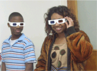 Students wear 3-D glasses to view a 3-D map of Alabama published by the GSA.