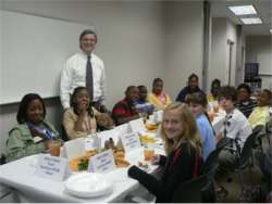 Dr. Gene Marsh visits with TMS students during lunch