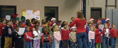 Woodland Forrest Elementary students sing Christmas Carols at Thompson Tractor